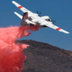 Illustration for article titled Why Airplanes Dump Red 'Water' On Fires